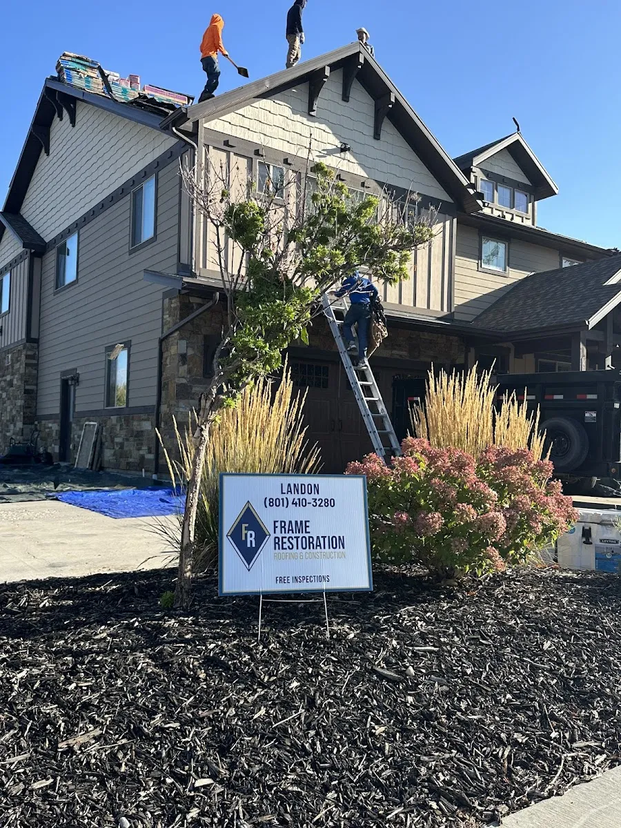 Frame Roofing Utah crew working on residential roof replacement in Utah